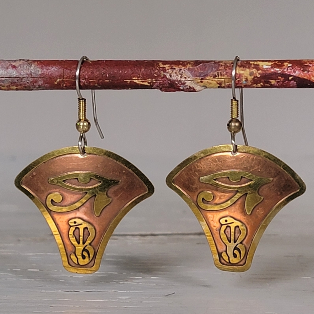 Vintage copper and brass earrings with eye and snake. 1 X 1.25 inch.